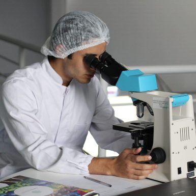 Man with microscope