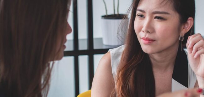 Two women in conversation