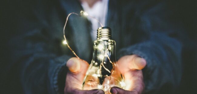 light bulb in hands