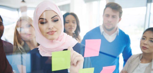 Muslim business womanin meeting with colleagues