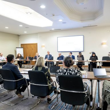 A LLBSP Board meeting. Members sat around a table